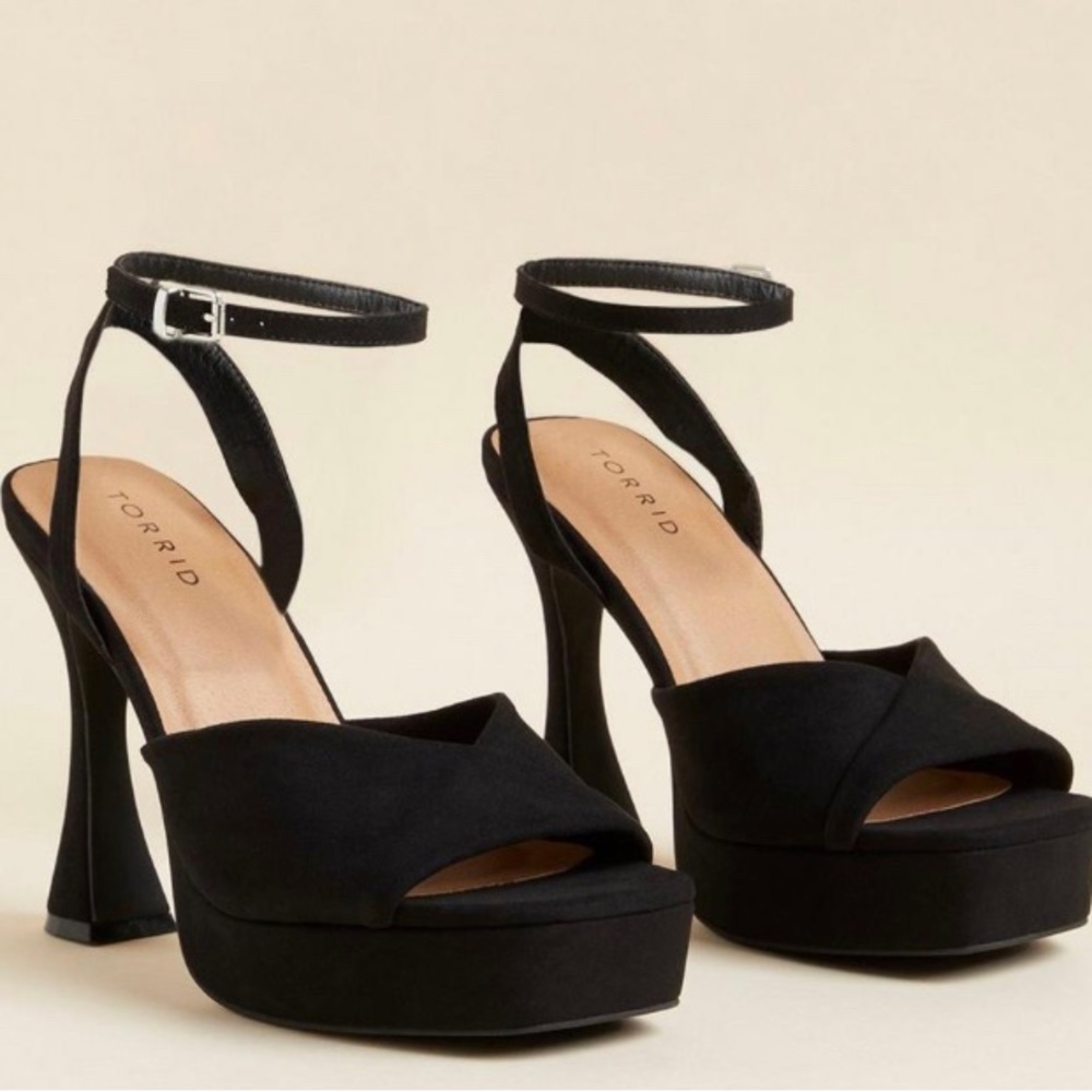 Torrid curved heel platform